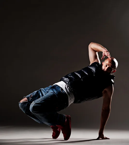 Breakdancer over dark background — Stock Photo, Image