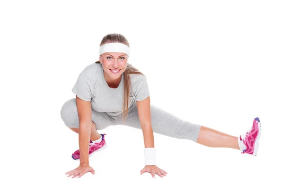 Fitness donna facendo stretching — Foto Stock