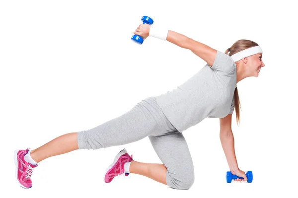 Sportswoman doing exercises — Stock Photo, Image