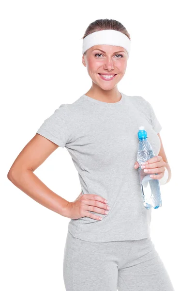 Desportista segurando garrafa de água — Fotografia de Stock