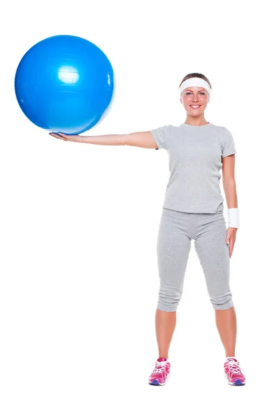 Sportowy kobieta gospodarstwa niebieski piłka — Zdjęcie stockowe