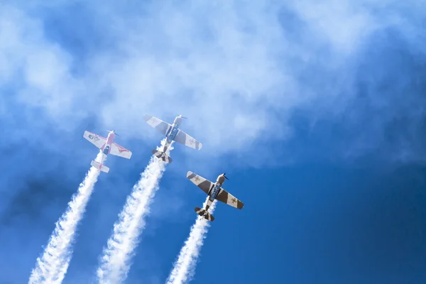 stock image Group of old timer planes performing acrobatics in the air