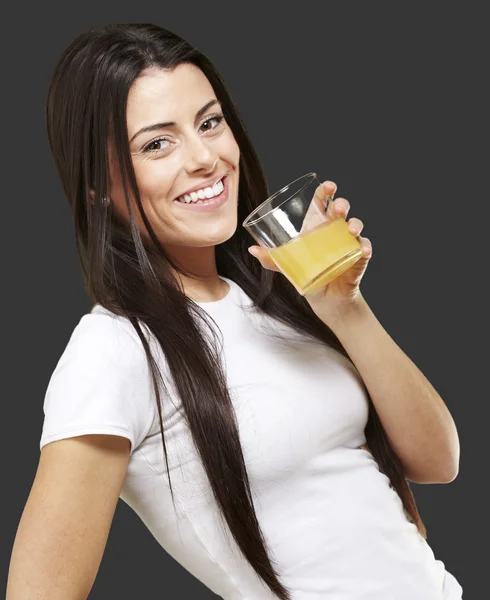 Woman holding a glass — Stock Photo, Image