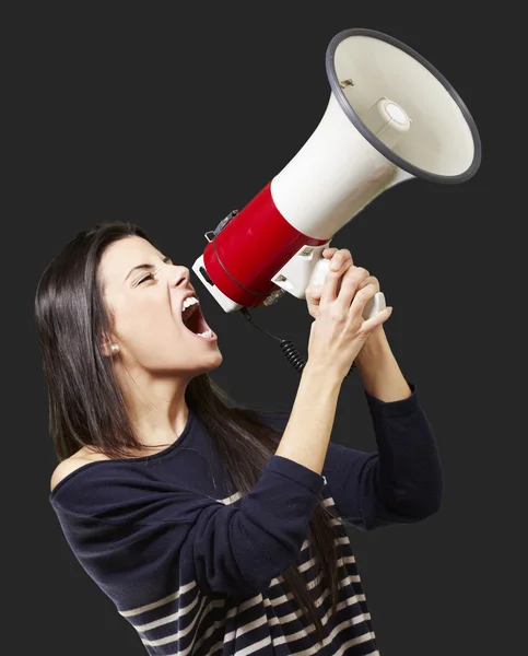 Woman with a megaphone — Stock Photo, Image