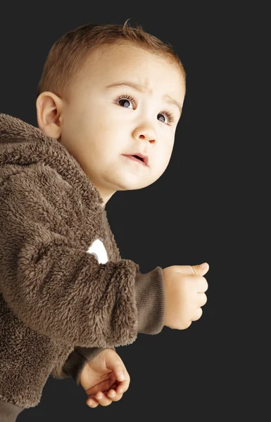 Portrait of a handsome kid wearing a brown bear sweatshirt and l — Stock Photo, Image