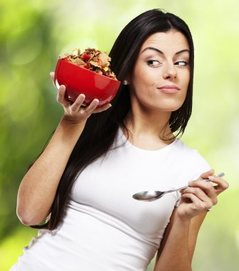 Woman holding breakfast bowl clipart