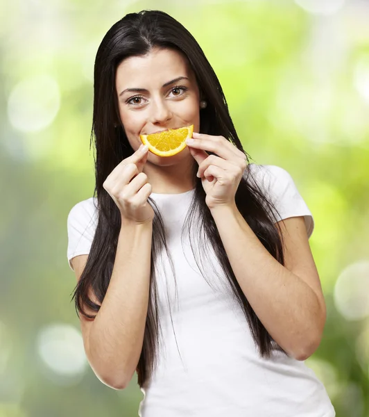 Woman with an orange smile Stock Image