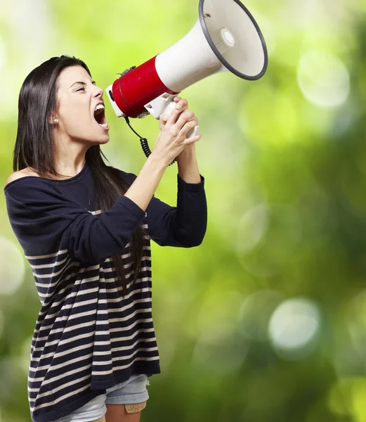 Woman with a megaphone Royalty Free Stock Images