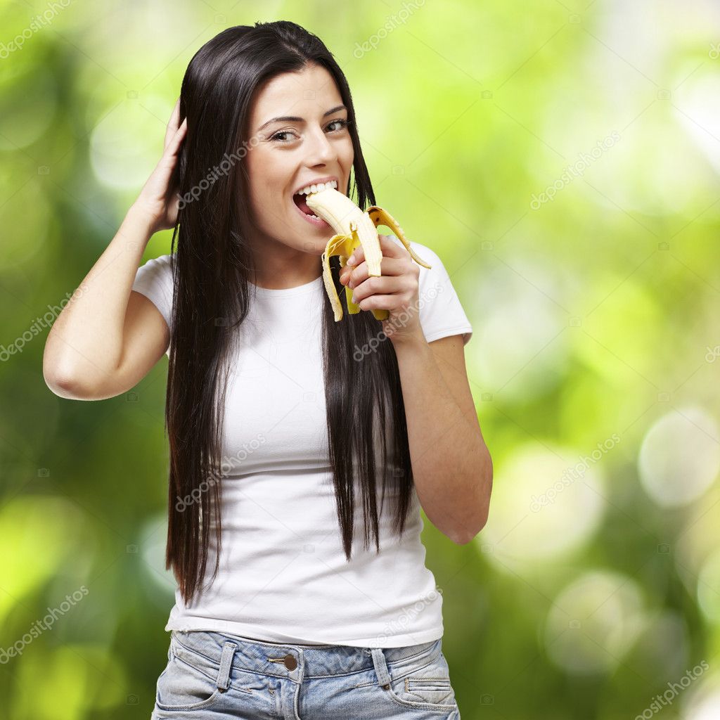 Woman eating a banana — Stock Photo © Krakenimages.com #11581571