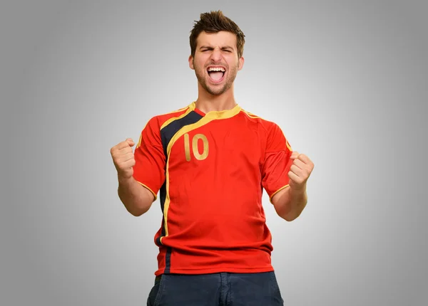 Studio Shot Of Excited Young Player — Stock Photo, Image
