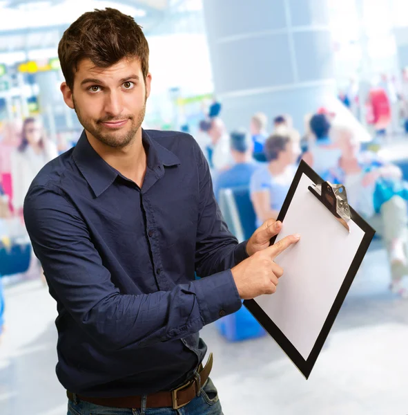 Portrait Of A Man Pointing On Clipboard — Stock Photo, Image