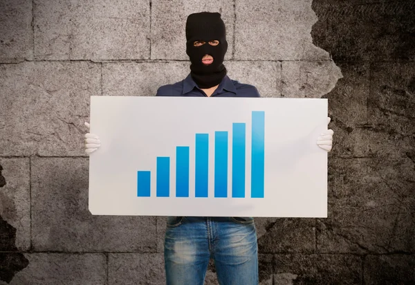 Portrait of a man wearing mask holding graph card — Stock Photo, Image
