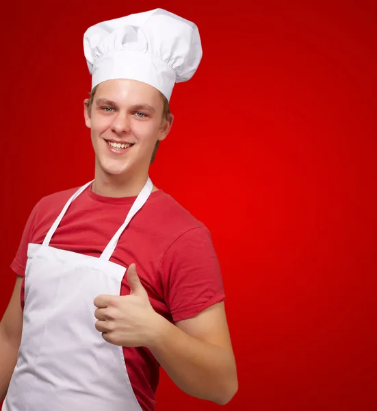 Vrolijke mannelijke chef-kok met Duimschroef opwaarts — Stockfoto