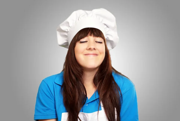 A fiatal, női szakács elégedett portréja — Stock Fotó