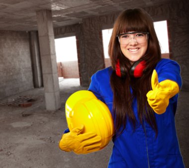 Portrait Of A Young Female Worker clipart