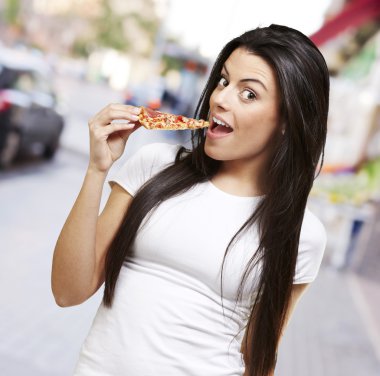 Woman eating pizza clipart