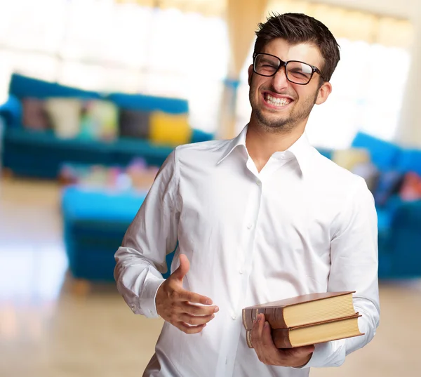 Portrait Of A Student Holding Book — Stock Photo, Image