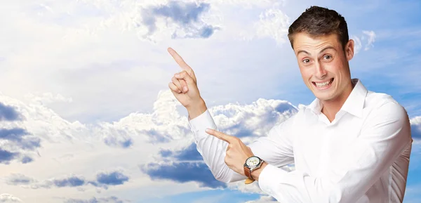 Portrait Of Handsome Mature Man Pointing Up Over — Stock Photo, Image