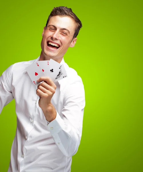 Póker kártya mutatja fiatalember portréja — Stock Fotó