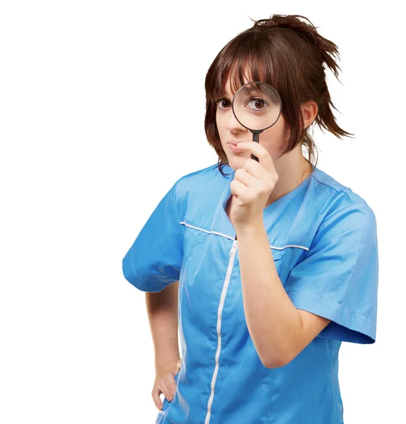 stock image Woman looking through magnifying glass