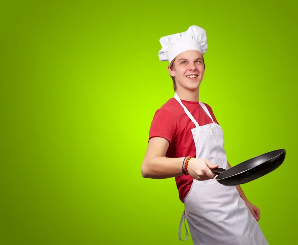 Portret van een chef-kok houden pan — Stockfoto