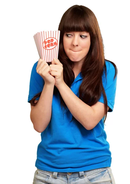 Dívka hospodářství prázdný popcorn paket — Stock fotografie