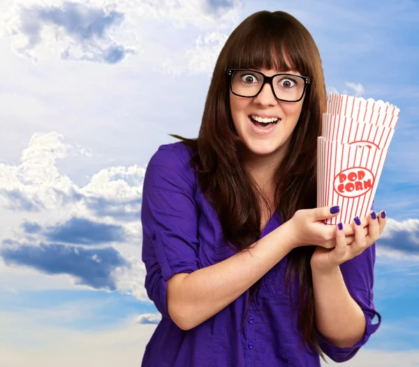 Casual Woman Holding Popcorn Container — Stock Photo, Image