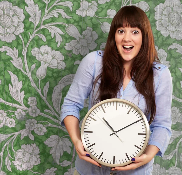 A Young Girl Holding A Clock — Stock Photo, Image