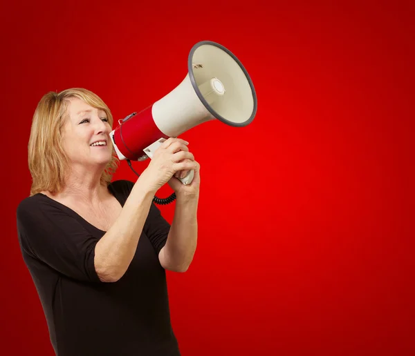 Woman with megaphone Royalty Free Stock Images