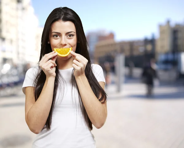 Woman with an orange smile Stock Picture