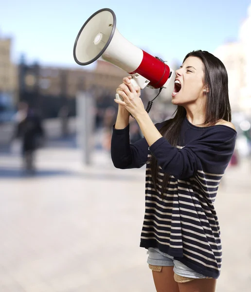 Woman with a megaphone Royalty Free Stock Photos