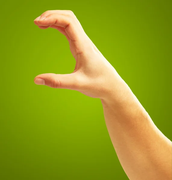 Sosteniendo la mano humana — Foto de Stock