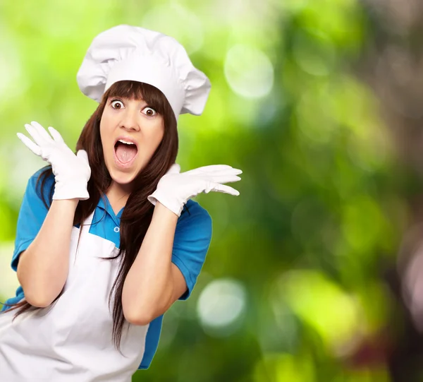 Šokovaný, Žena na vaření čas — Stock fotografie