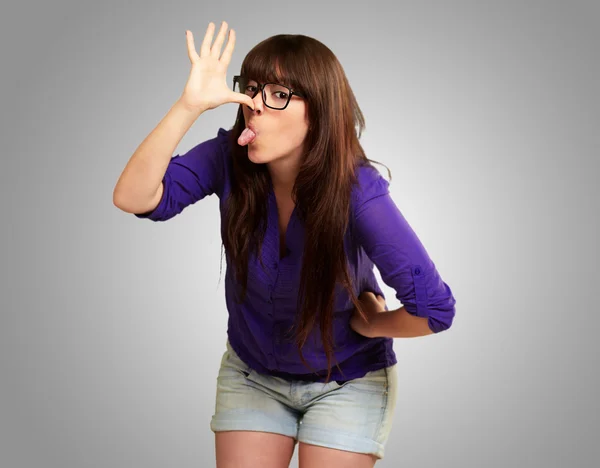 Portrait of a female making funny face — Stock Photo, Image