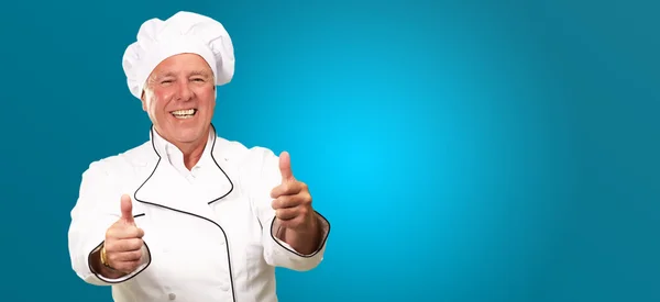 Portrét kuchař kuchař s rukou znamení — Stock fotografie