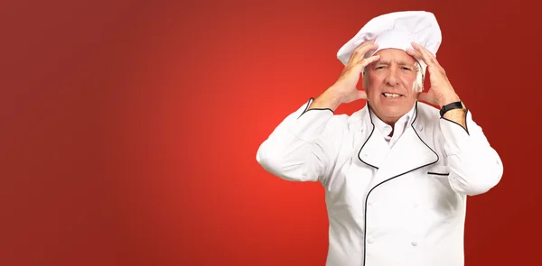 Porträt eines Kochs mit Kopfschmerzen — Stockfoto