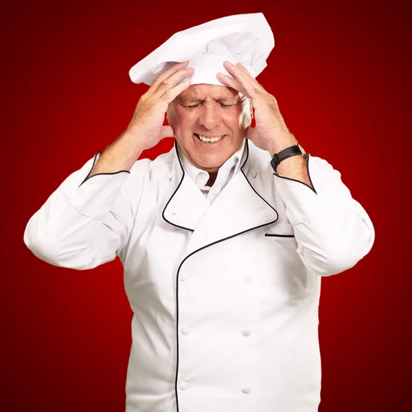 Porträtt av kock med smärtsamt huvud — Stockfoto