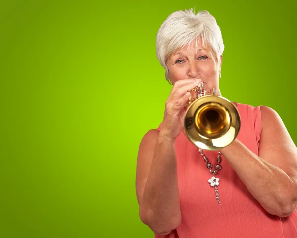 Mature Woman Blowing Her Trumpet — Stock Photo, Image