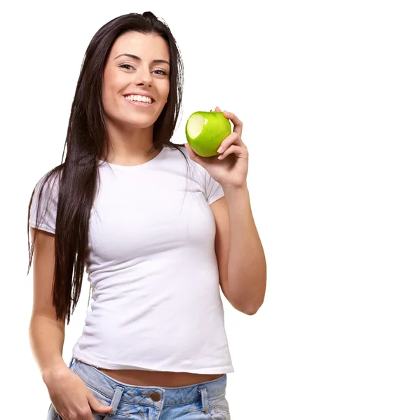 Портрет женщины, съедающей яблоко — стоковое фото