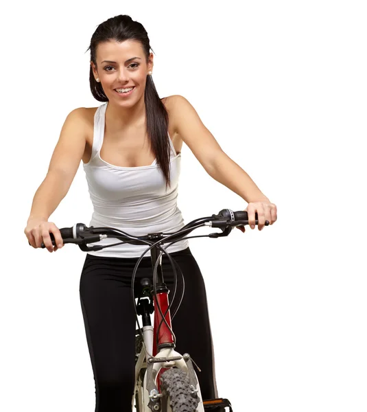 Portrait of a young girl sitting in bicycle — Stock Photo, Image
