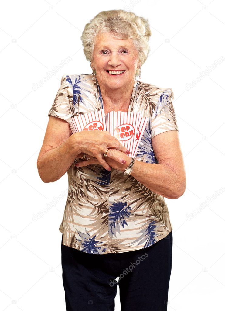 Portrait Of A Senior Woman Holding Popcorn Box