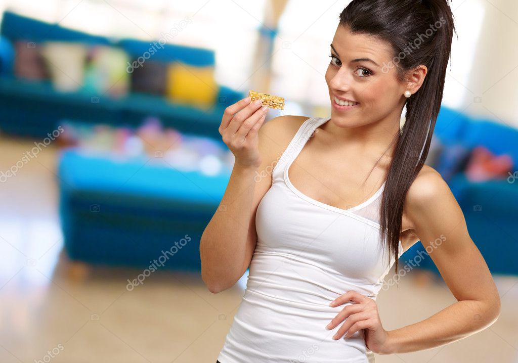 Portrait Of A Woman showing Granola Bar