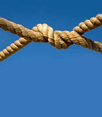 Old rope against sky clipart