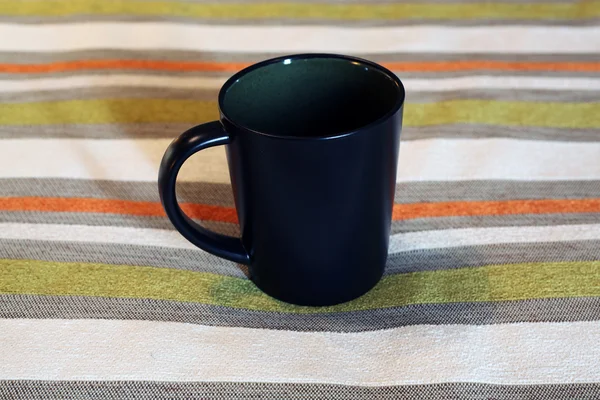 Um copo preto — Fotografia de Stock