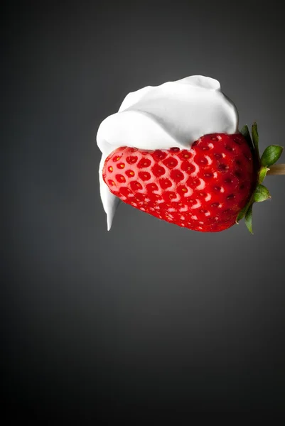 Cream on strawberry — Stock Photo, Image