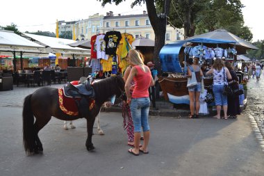 On Deribasovskaya Street in Odessa clipart