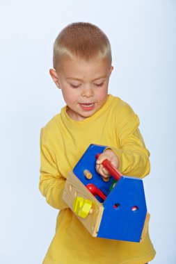 Boy with toy toolbox clipart