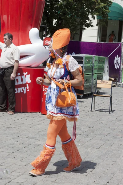 Dutch woman-fan in a flamboyant costume — Stock Photo, Image