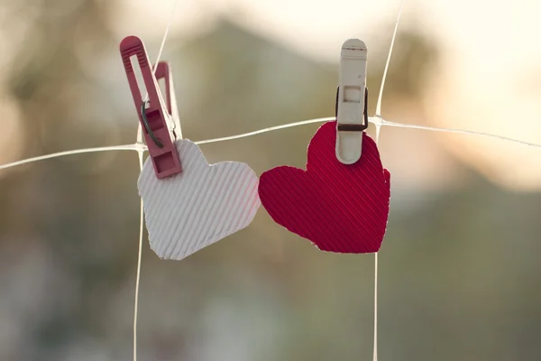 Two homemade hearts on line in front — Stock Photo, Image