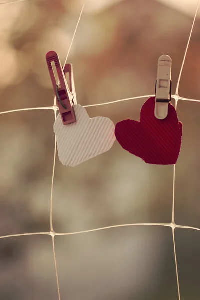 Two homemade hearts on line in front — Stock Photo, Image